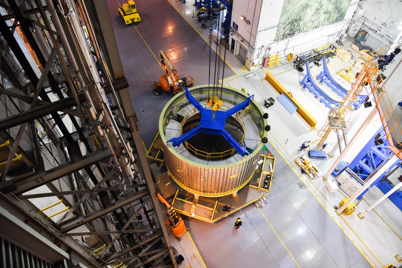 The Space Launch System (SLS) rocket’s liquid oxygen tank structural test article was manufactured and stacked in June 2019 at NASA’s Michoud Assembly Facility in New Orleans. To construct the test article, Boeing technicians at Michoud moved the liquid oxygen tank to the Vertical Assemby Building stacking and integration area. Here, they added simulators to mimic the two structures that connect to the tank, the intertank and the forward skirt.  This structural hardware for the SLS core stage for America’s new deep space rocket is structurally identical to the flight version of the tank. It will be shipped on the Pegasus barge to NASA’s Marshall Space Flight Center in Hunstville, Alabama, where it will undergo a series of tests that simulate the stresses and loads of liftoff and flight. These tests will help ensure designs are adequate for successful SLS missions to the Moon and beyond. The flight liquid oxygen tank along with the liquid hydrogen tank supplies more than 500,000 gallons of propellant to the core stages four RS-25 engines, which produce 2 million pounds of thrust to help send the SLS rocket to space.